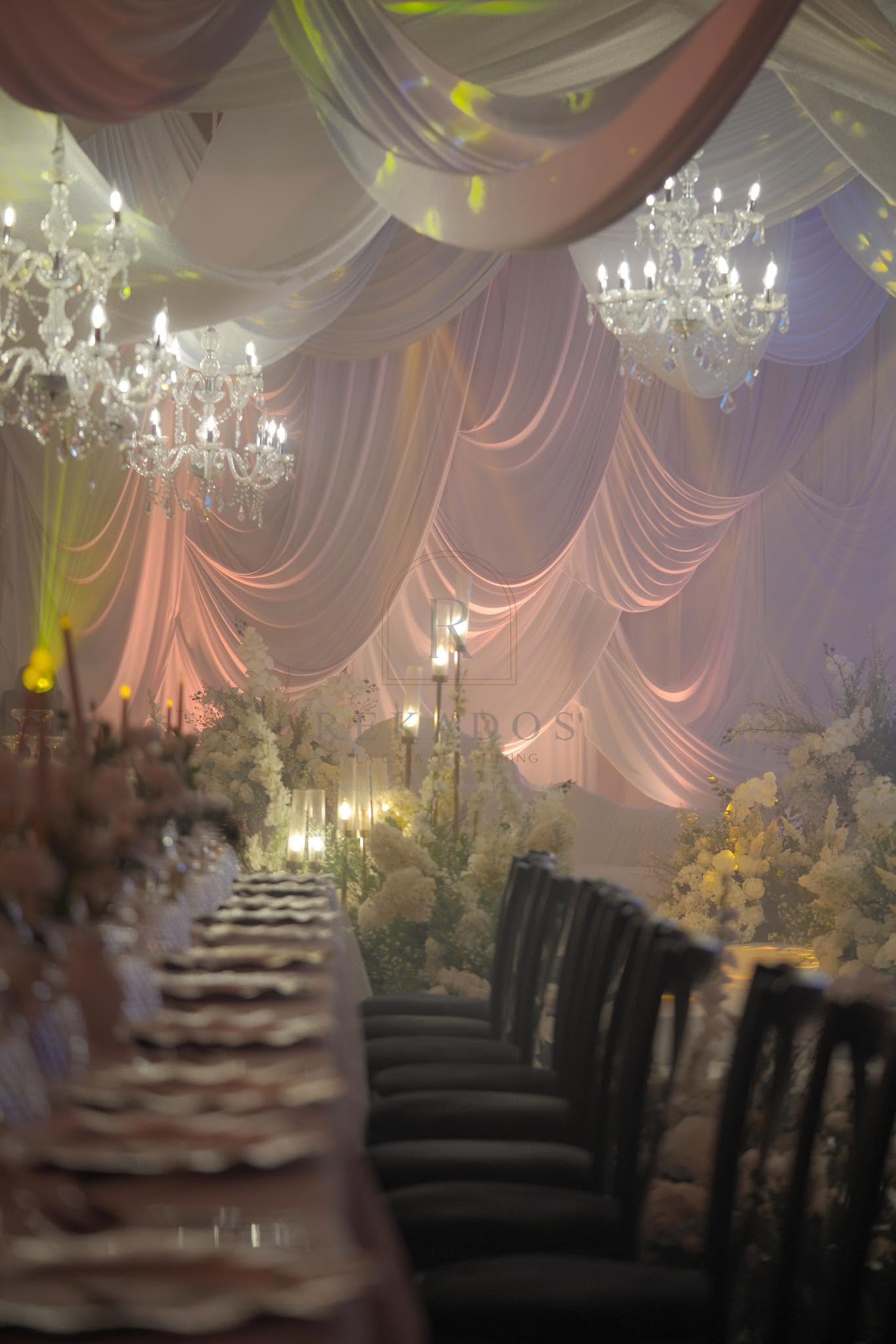 Chandelier-draped reception tent